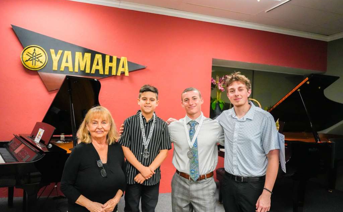 Larissa with senior students at a recital